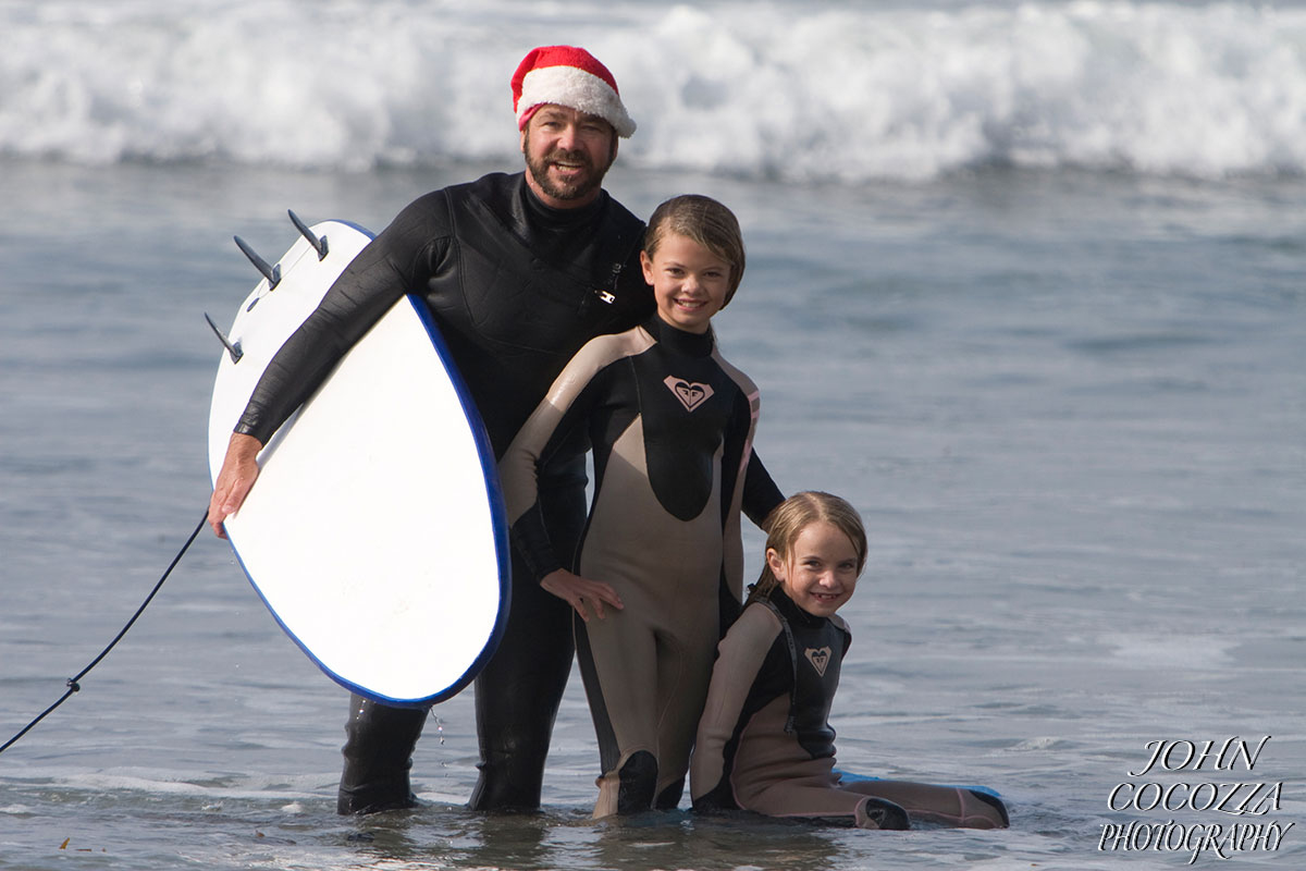 family surfing photos in san diego by photographer john cocozza