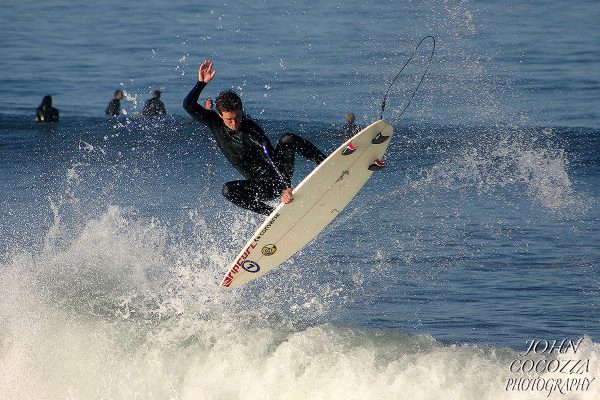surfing photographer at windansea beach in la jolla by john cocozza photography