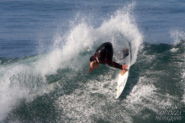 surfing photographer at windansea beach in la jolla by john cocozza photography