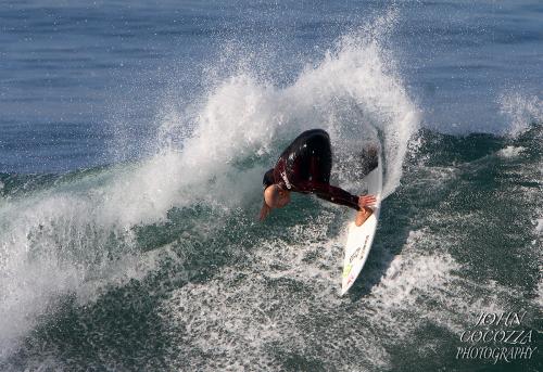 surfing photographer at windansea beach in la jolla by john cocozza photography